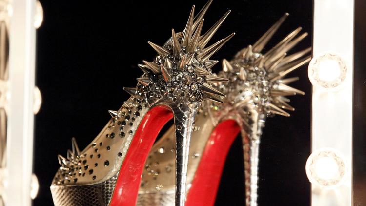 Des chaussures Louboutin exposées à Londres au musée de la mode, en avril 2012 [Justin Tallis / AFP/Archives]