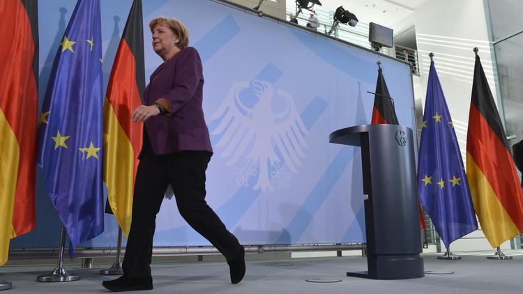 La chancelière allemande Angela Merkel réagit à l'attribution du Nobel de la Paix à l'UE, à Berlin, le 12 octobre 2012 [Odd Andersen / AFP]