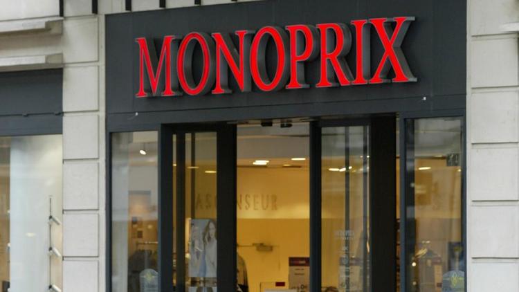 L'enseigne d'un magasin Monoprix [Jacques Demarthon / AFP/Archives]