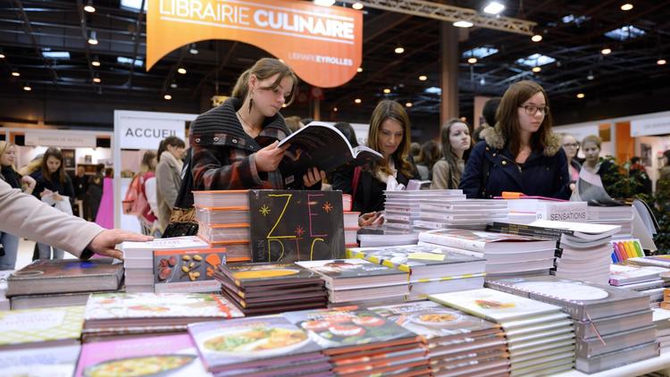 Le salon du livre 2013 à Paris, au rayon livres de cuisine [Eric Feferberg / AFP/Archives]
