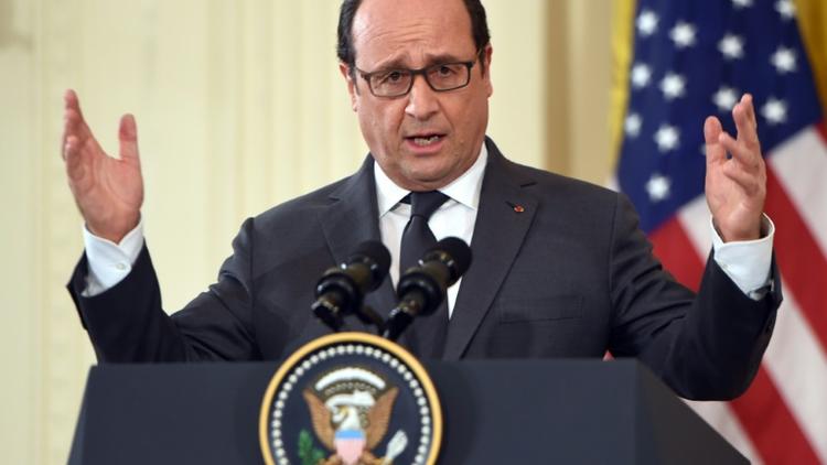François Hollande pendant une conférence de presse conjointe avec Barack Obama à la Maison-Blanche le 24 novembre 2015 [NICHOLAS KAMM / AFP]