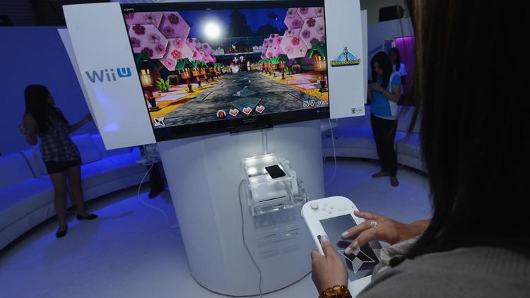 Une personne essaie la nouvelle Wii U de Nintendo à Los Angeles [Michael Buckner / Getty Images/AFP/Archives]