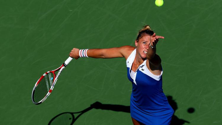 La Française Pauline Parmentier contre la Tchèque Petra Kvitova, à l'US Open, le 31 août 2012 à New York. [Elsa / AFP/Getty Images]