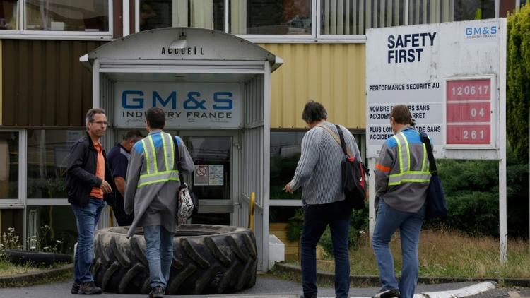 Des employés arrivent au site de GM&S, le 12 juillet 2017 à La Souterraine [PASCAL LACHENAUD / AFP/Archives]