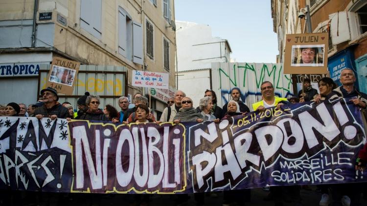 Manifestation à Marseille, le 9 novembre 2019, un an après l'effondrement de deux immeubles insalubres ayant fait huit morts, rue d'Aubagne [CLEMENT MAHOUDEAU / AFP]