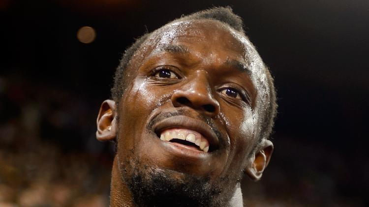 Le Jamaicain Usain Bolt après avoir remporté le 100 m du meeting de Zurich le 29 août 2013 [Fabrice Coffrini / AFP/Archives]