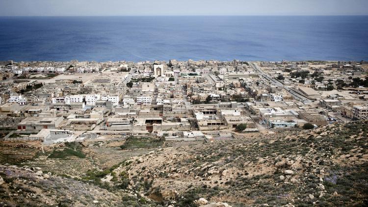 Vue générale de la ville de Derna dans l'est de la Libye, datant du 15 mars 2011, où aurait eu lieu une exécution publique dans un stade selon Amnesty international
 [Alessio Romenzi / AFP/Archives]