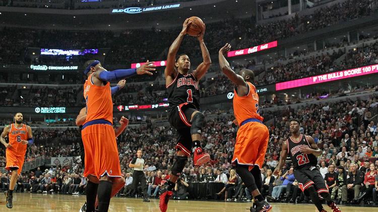 Derrick Rose (c) des Chicago Bulls lors du match contre les New York Knicks, le 31 octobre 2013 à Chicago [Jonathan Daniel / Getty Images/AFP]