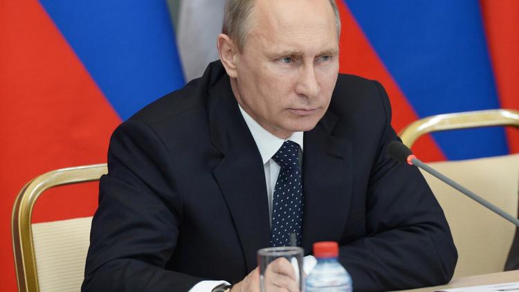 Le président russe Vladimir Poutine lors d'une conférence à Astrakhan, le 4 juin 2014 [Alexei Nikolsky / RIA-NOVOSTI/AFP]
