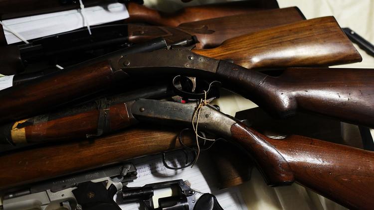 Des pistolets et des fusils [Spencer Platt / Getty Images/Getty Images]