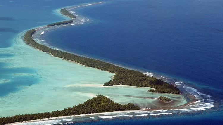 Tuvalu, dans le Pacifique-sud, fait partie des petits Etats insulaires inquiets pour leur survie, qui vont implorer les grandes nations d'enrayer le réchauffement climatique [Torsten Blackwood / AFP/Archives]