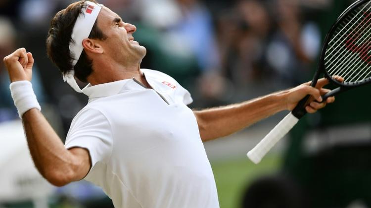 Roger Federer après sa victoire en demi-finale de Wimbledon contre Rafael Nadal, le 12 juillet 2019 [Daniel LEAL-OLIVAS / AFP]