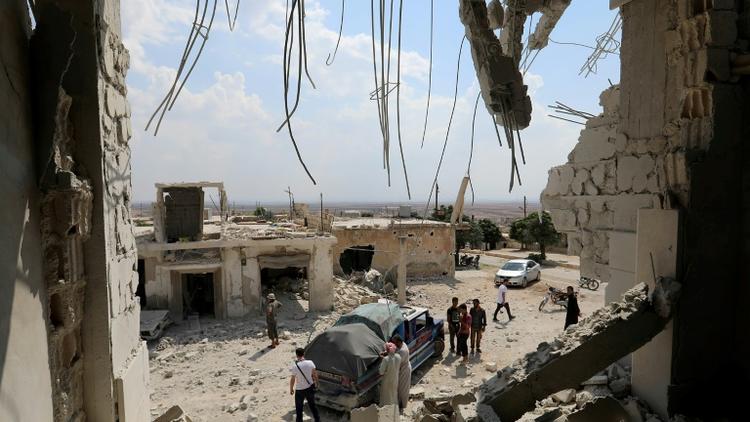Les destructions après les bombardements du régime syrien sur le village de Hbit dans le sud de la province d'Idleb, le 9 septembre 2018 [OMAR HAJ KADOUR / AFP]