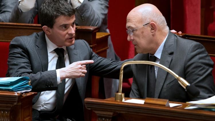 Manuel Valls et Michel Sapin à l'Assemblée nationale le 21 janvier 2014 [JOEL SAGET / AFP/Archives]