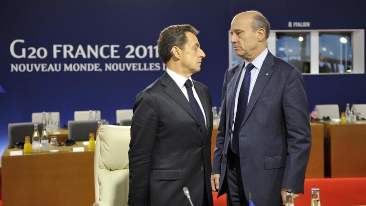Nicolas Sarkozy et Alain Juppé à Cannes, le 3 novembre 2011 [Eric Feferberg / AFP/Archives]
