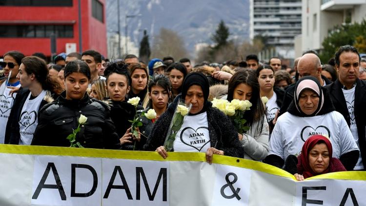 Une marche en hommage à Adam Soli and Fatih Karakuss, à Grenoble le 6 mars 2019 [JEAN-PIERRE CLATOT / AFP]