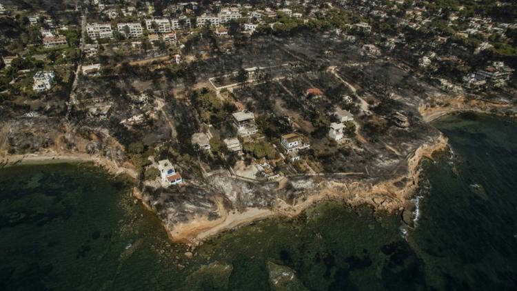 La station balnéaire de Mati, près d'Athènes, a été dévastée par les incendies, ici le 26 juillet 2018 [SAVVAS KARMANIOLAS / AFP]