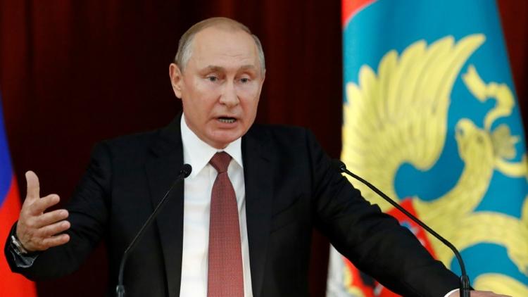 Le président russe Vladimir Poutine intervient devant les ambassadeurs de Russie réunis à Moscou, le 19 juillet 2018 [SERGEI KARPUKHIN / POOL/AFP]