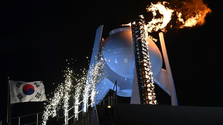 Allumage de la vasque olympique lors de la cérémonie d'ouverture des JO-2018, le 9 février 2018 à Pyeongchang  [Mark RALSTON / AFP]