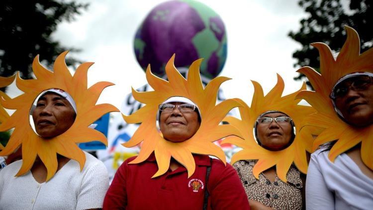 Des manifestants contre le réchauffement climatique, à Manille le 28 novembre 2015 [NOEL CELIS / AFP]