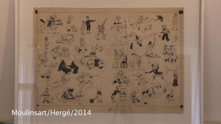 Photo extraite d'une video montrant la planche originale de Tintin signée par Hergé en 1937 vendue samedi aux enchères à Paris pour 2,519 millions d'euros par la maison de ventes Artcurial [ / AFP]