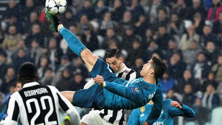 Cristiano Ronaldo (c) ouvre le score pour le Real en C1 face à la Juventus, avec un retourné acrobatique d'anthologie, le 3 avril 2018 à Turin  [Alberto PIZZOLI / AFP]