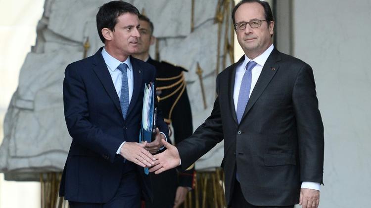 Manuel Valls et François Hollande sur le perron de l'Elysée le 2 novembre 2016 à Paris [STEPHANE DE SAKUTIN / AFP/Archives]