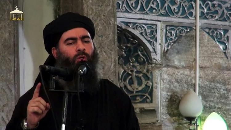Capture d'écran d'une vidéo de propagande diffusée le 5 juillet 2014 lors d'une adresse présumée du chef du groupe Etat islamique (EI), Abou Bakr al-Baghdadi, dans une mosquée de Mossoul, dans  le nord de l'Irak [- / AL-FURQAN MEDIA/AFP/Archives]