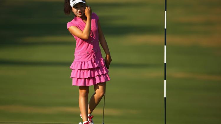 L'Américaine Lucy Li, 11 ans, lors d'un entraînement sur le parcours de golf de Pinehurst (Caroline du nord), le 18 juin 2014 [Streeter Lecka / GETTY IMAGES NORTH AMERICA/AFP/Archives]