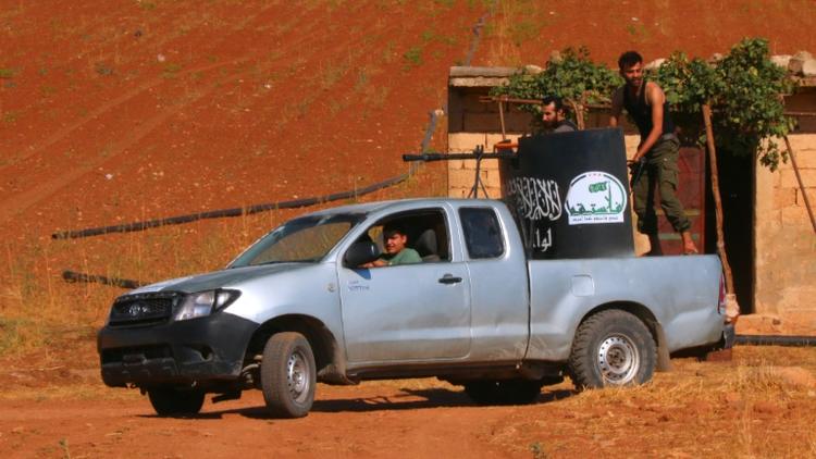 Des combattants à bord d'un véhicule armé le 1er septembre 2015 à Marea [ZAKARIYA AL-KAFI / AFP/Archives]