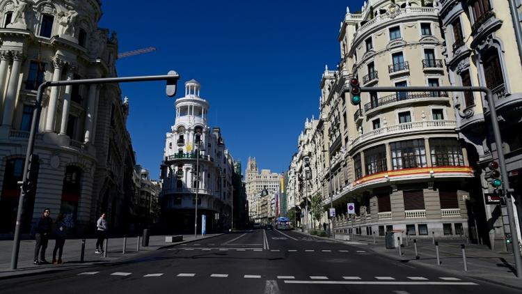 La Gran Via de Madrid quasiment déserte, le 14 mars 2020 [JAVIER SORIANO / AFP]