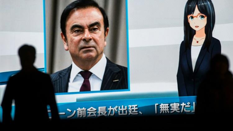 La télévision japonaise diffuse des informations sur Carlos Ghosn sur un écran géant, le 8 janvier 2019 à Tokyo [Behrouz MEHRI / AFP/Archives]