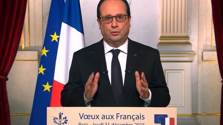 Capture d'écran d'une vidéo de François Hollande adressant ses voeux aux Français le 21 décembre 2015 à l'Elysée à Paris [STRINGER / AFP/Archives]