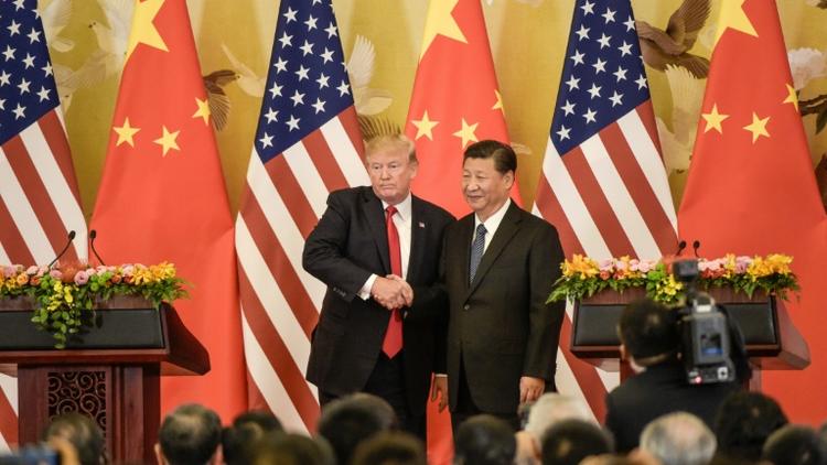 Les présidents américain Donald Trump et chinois Xi Jinping, à Pékin le 9 novembre 2017 [Fred DUFOUR / AFP/Archives]