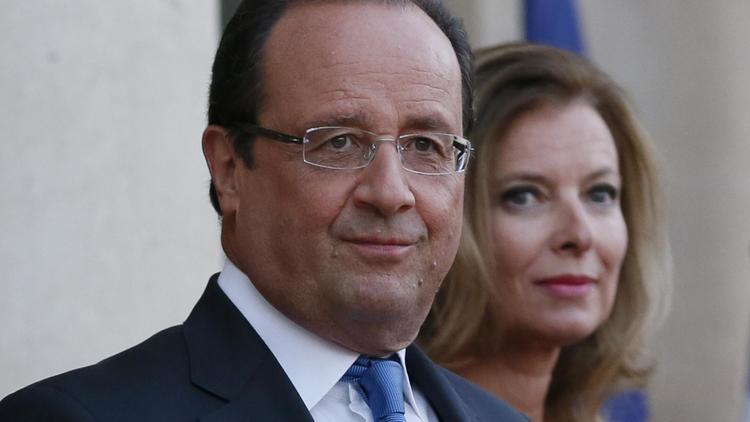 Le président français François Hollande et sa compagne Valérie Trierweiler à l'Elysée à Paris le 3 septembre 2013 [Patrick Kovarik / AFP/Archives]