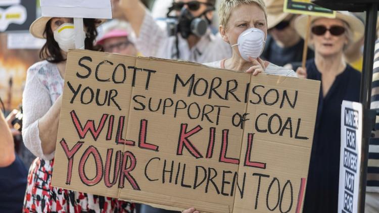 Manifestation contre le Premier ministre australien Scott Morrison, le 19 décembre 2019 à Sydney [Wendell TEODORO / AFP]