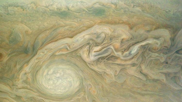 Une image diffusée le 19 mai 2017 par la Nasa illustrant les ouragans détectés par la sonde Juno sur Jupiter [Handout / NASA/JPL-CALTECH/SWRI/MSSS/AFP/Archives]