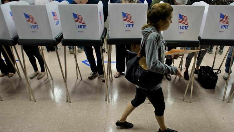  Un bureau de vote dans le Maryland, le 28 octobre 2016 [Brendan Smialowski / AFP/Archives]