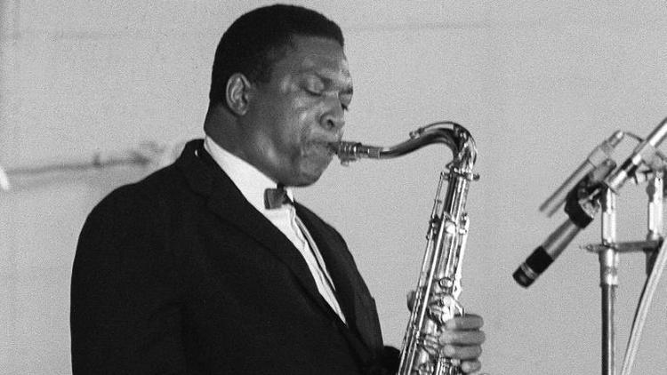 Photo non datée du saxophoniste ténor américain John Coltrane en concert à Paris [ / AFP/Archives]