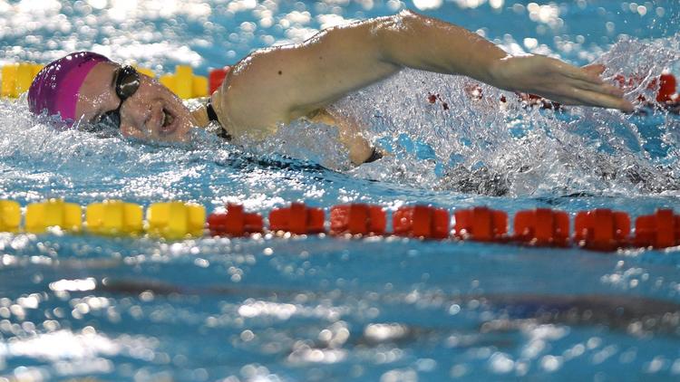 La nageuse française Camille Muffat dans le 200m nage libre pendant les championnats de France petit bassin à Dijon, le 8 décembre 2013 [Romain Lafabregue / AFP/Archives]