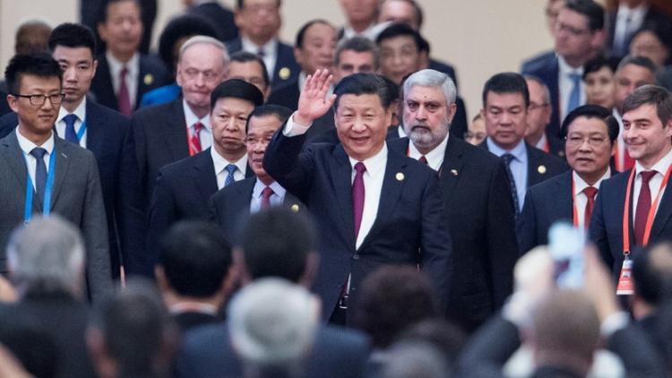 Le président chinois Xi Jinping (C), à Pékin le 1er décembre 2017 [FRED DUFOUR / POOL/AFP/Archives]