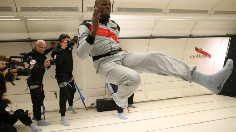 Photo fournie par Mumm et Novespace le 13 septembre 2018 d'Usain Bolt tentant de sprinter en apensanteur dans un avion survolant la France [Laurent Theillet / Mumm/Novespace/AFP]