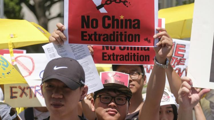 Manifestation contre le projet de loi du gouvernement local d'autoriser les extraditions vers la Chine continentale, le 9 juin 2019 à Hong Kong [RINGO CHIU / AFP]