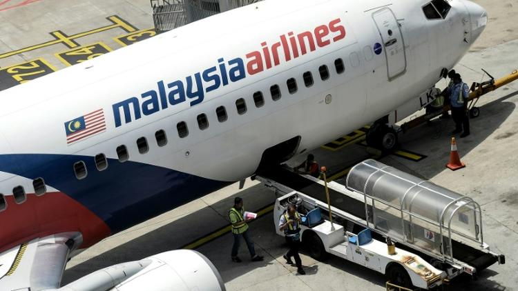 Un avion de la Malaysia Airlines sur le tarmac de l'aéroport de Kuala Lumpur, à 50 km au sud de la ville, le 25 février 2016 [MANAN VATSYAYANA / AFP/Archives]