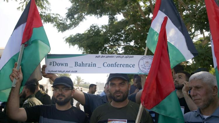 Des Palestiniens manifestent contre la présentation à Bahreïn du volet économique du plan de paix de Washington pour le Proche-Orient, à Gaza, le 24 juin 2019 [MOHAMMED ABED / AFP]