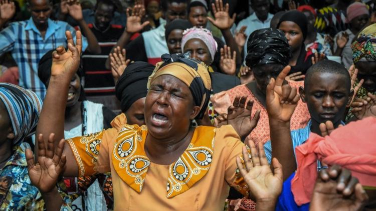 Des fidèles pendant une prière à Dar es Salaam, le 1er janvier 2020 [Ericky BONIPHACE / AFP]