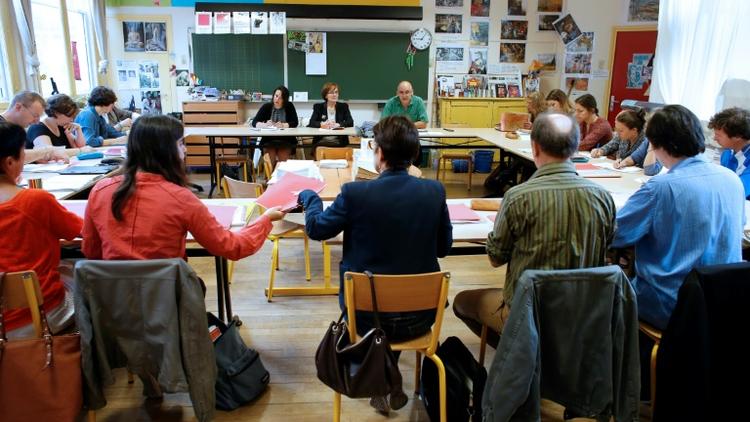 Des professeurs d'une école parisienne se réunissent le 1er septembre 2014 à l'aube de la rentrée des classes [THOMAS SAMSON / AFP/Archives]