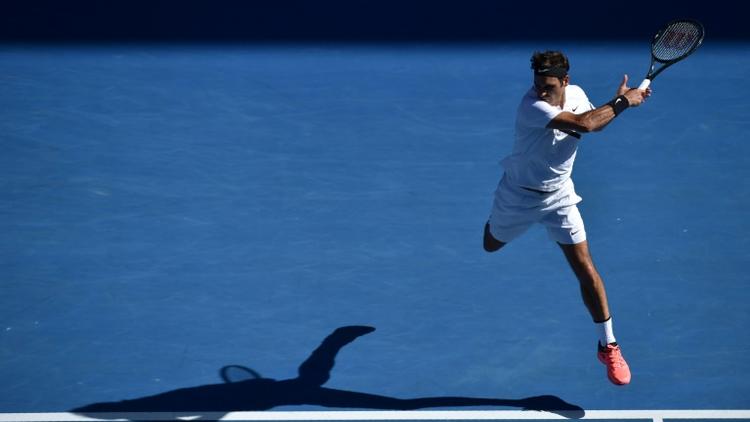 Le Suisse Roger Federer lors de son 8e de finale victorieux face au Hongrois Marton Fucsovics à l'Open d'Australie, le 22 janvier 2018 à Melbourne [PETER PARKS / AFP]
