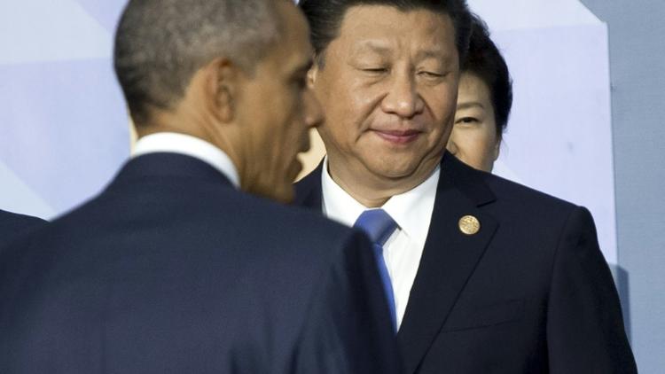 Le président américain Barack Obama (à gauche) et le président chinois Xi Jinping à Manille le 19 novembre 2015 [SAUL LOEB / AFP/Archives]