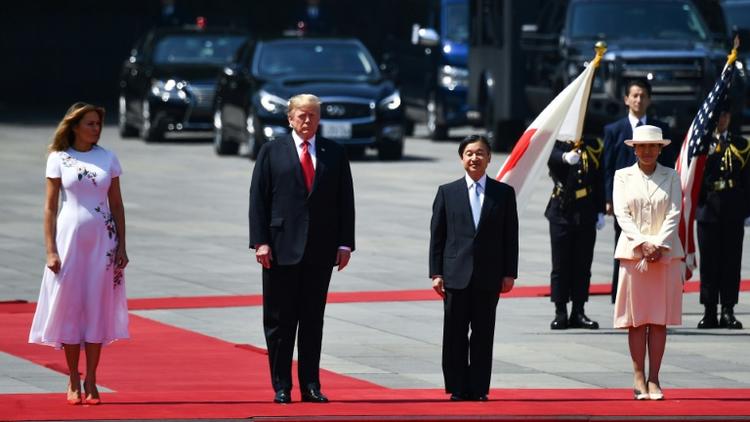 (De G à D) La première dame des Etats-Unis Melania Trump, le président américain Donald Trump, l'Empereur japonais Naruhito et son épouse Masako lors d'une cérémonie à Tokyo le 27 mai 2019 [Brendan SMIALOWSKI / AFP]